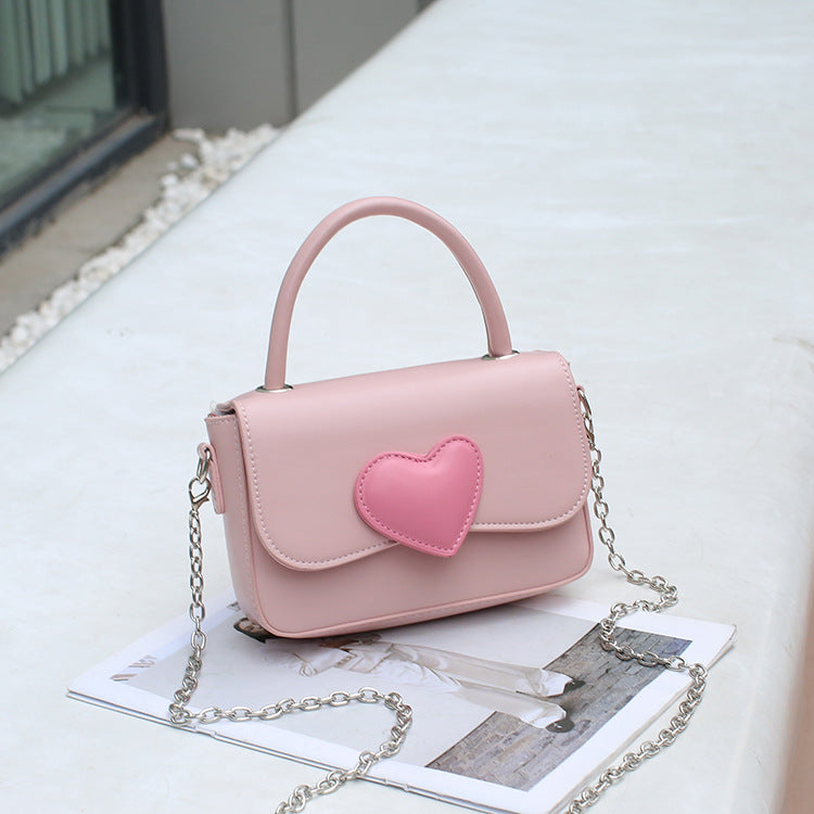 Contrast color peach heart crossbody bag